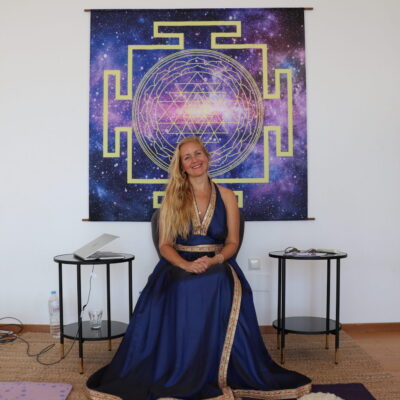 Liisa Maimon, Founder and Senior Teacher of Somananda Tantra School, in front of Sri Yantra - Tripura Sundari - Divine Feminine Sacred Geometry.